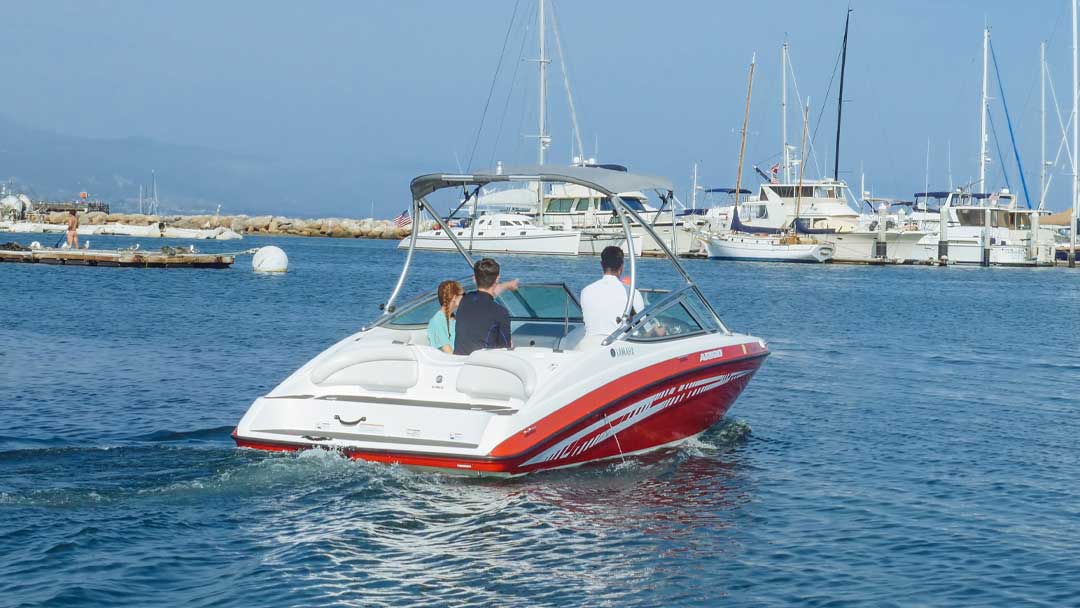 A family on a small speed boat