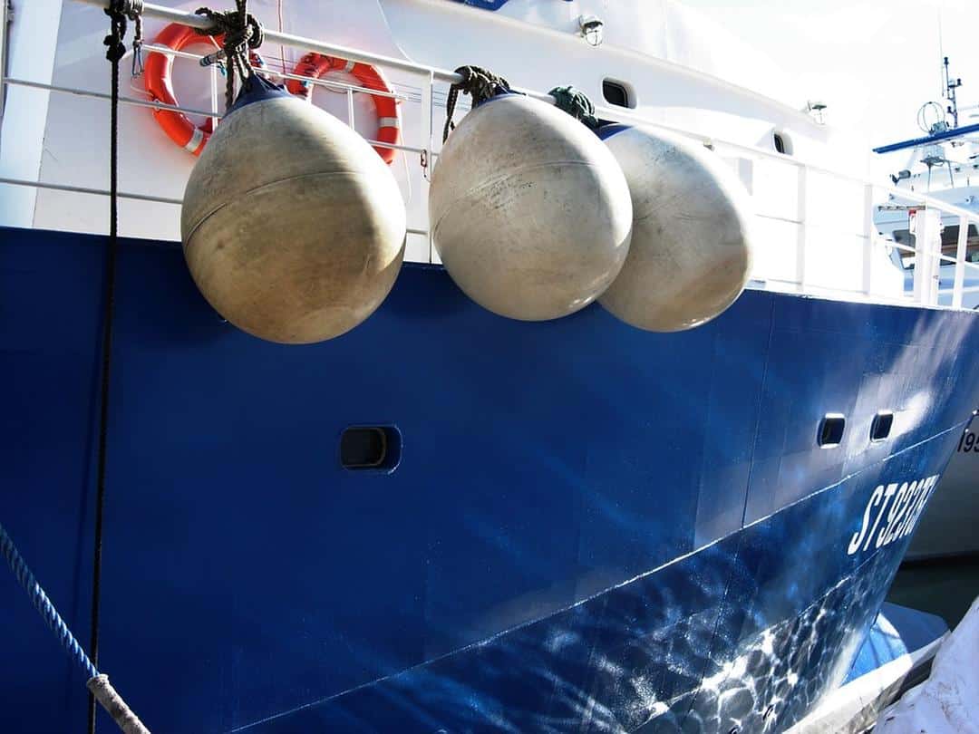 Boat Buoys and blue Boat Hull