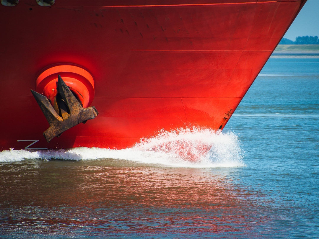 Red iron boat hull free from marine fouling